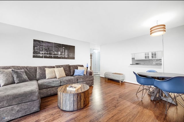 living room featuring dark hardwood / wood-style floors