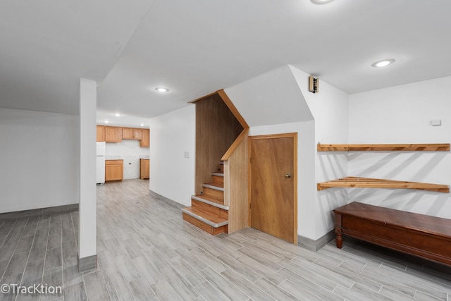 stairs with hardwood / wood-style floors