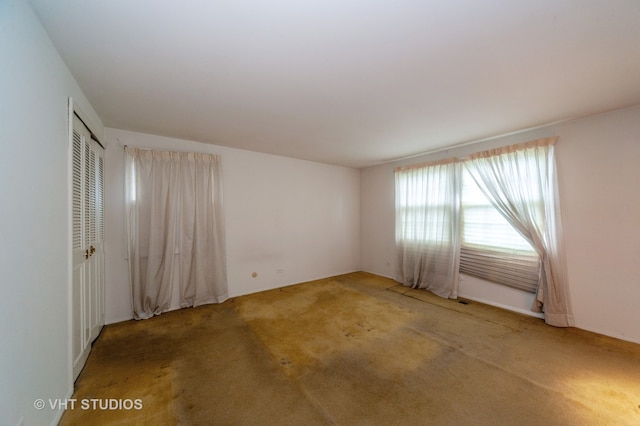 view of carpeted spare room