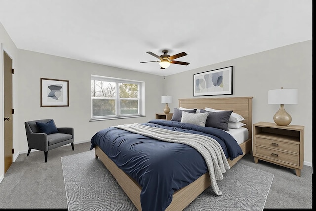 bedroom featuring ceiling fan and carpet flooring