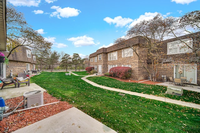 view of yard with a patio area