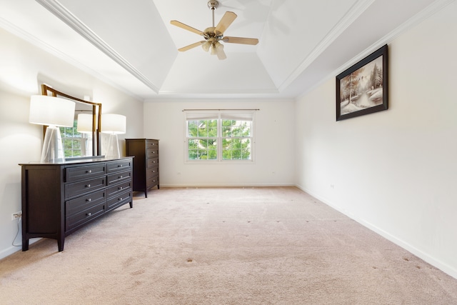 bedroom featuring baseboards, light colored carpet, and crown molding