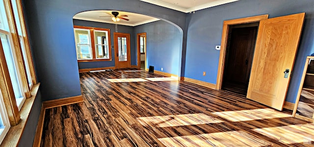 entrance foyer with wood-type flooring, ceiling fan, and crown molding