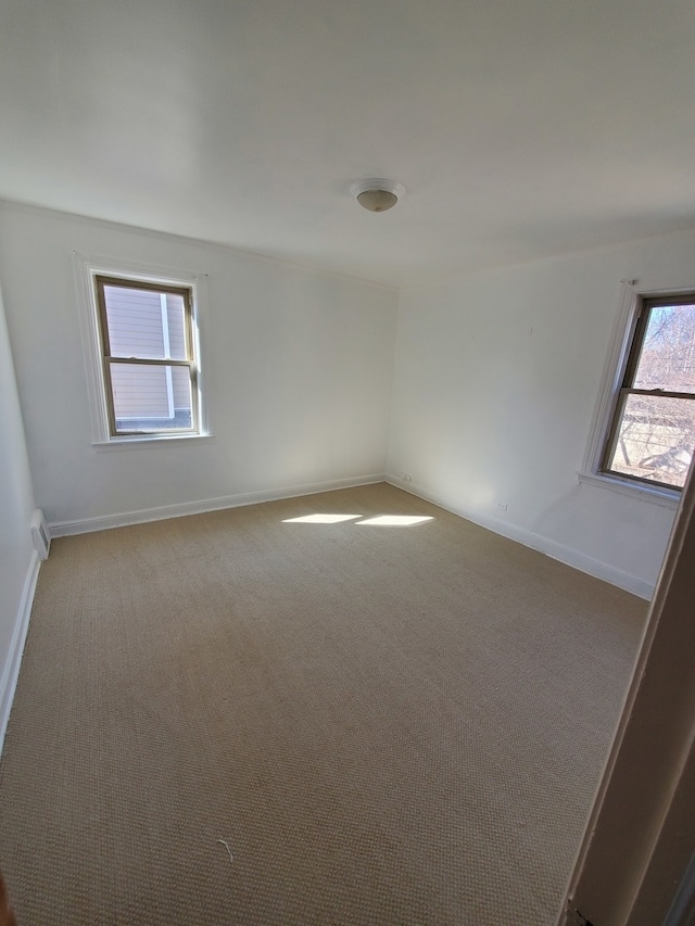 unfurnished room with carpet floors