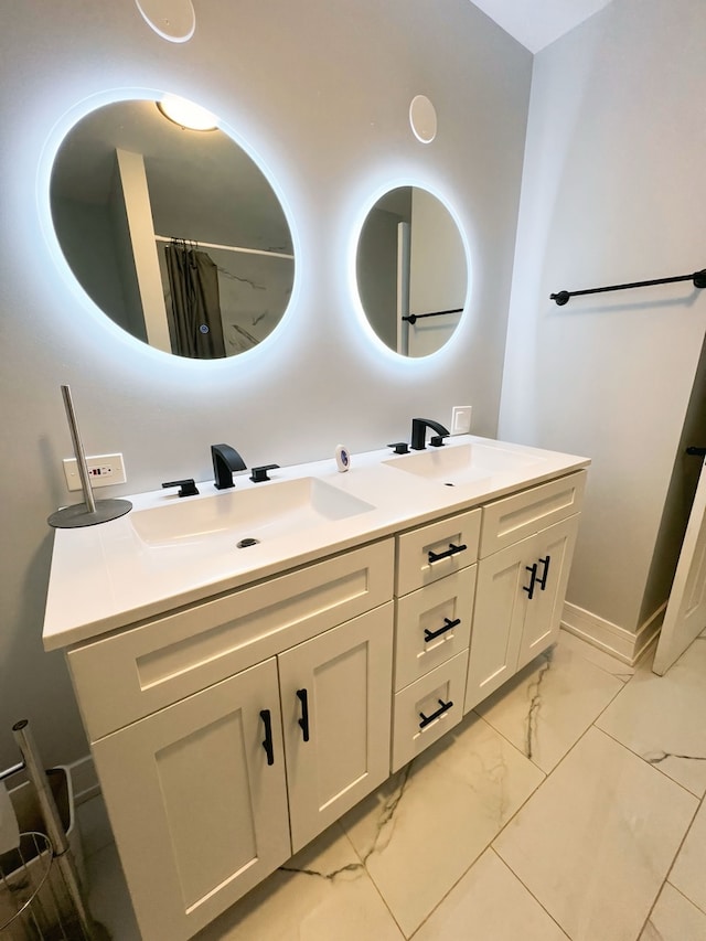 bathroom with vanity and walk in shower