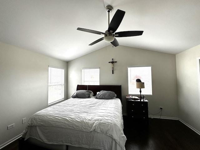 bedroom featuring dark hardwood / wood-style flooring, ceiling fan, and lofted ceiling