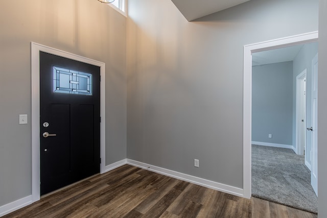 foyer with dark hardwood / wood-style flooring