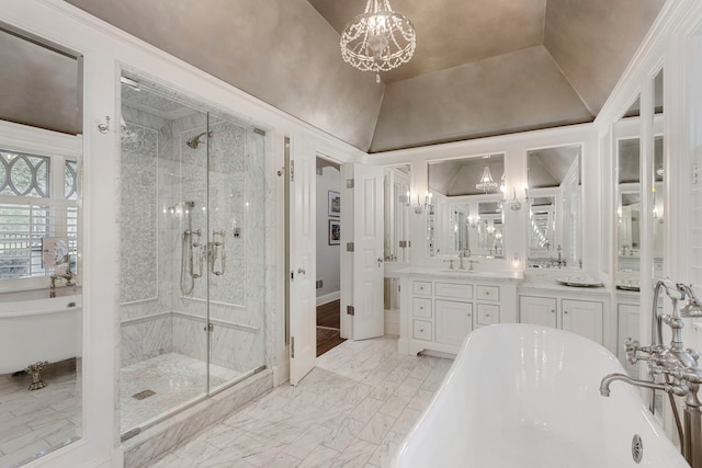 bathroom featuring plus walk in shower, vanity, lofted ceiling, and a notable chandelier