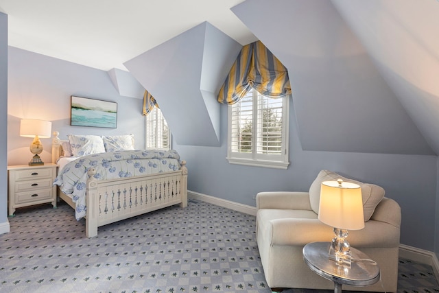 bedroom featuring vaulted ceiling