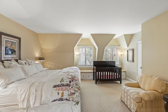 bedroom featuring light carpet