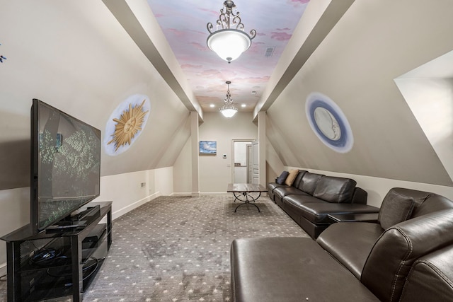 living room with carpet floors and vaulted ceiling