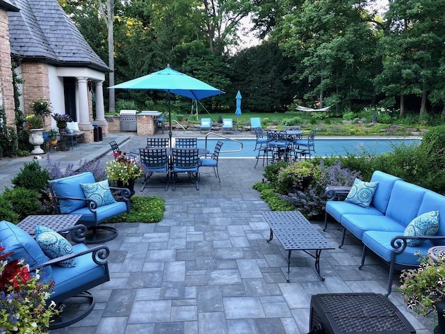 view of patio featuring outdoor lounge area and area for grilling