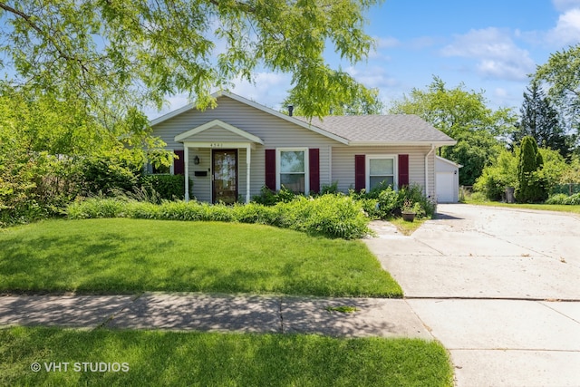 ranch-style home featuring a front yard and a garage