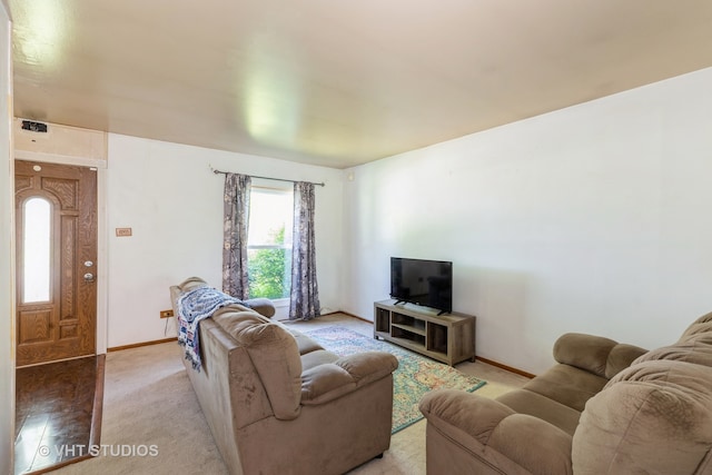 living room featuring light colored carpet