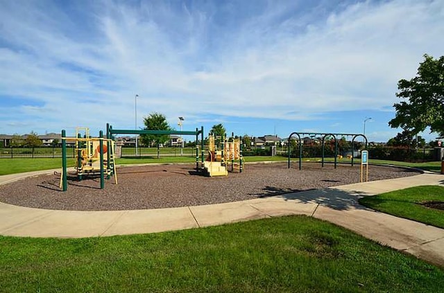 view of play area with a yard