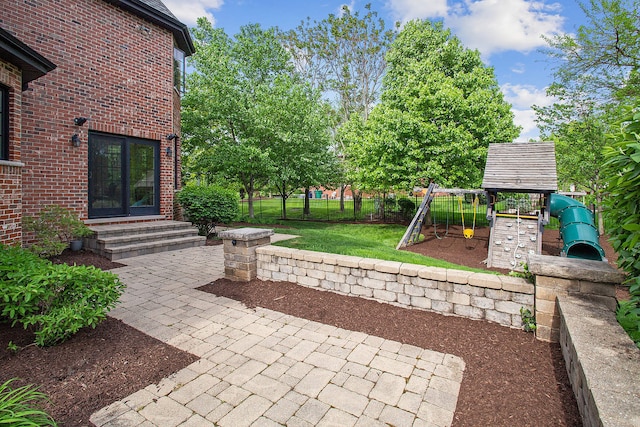 view of patio with a playground