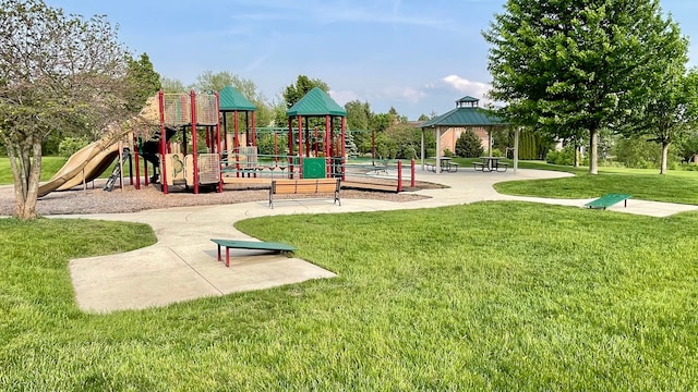 view of playground with a gazebo and a yard