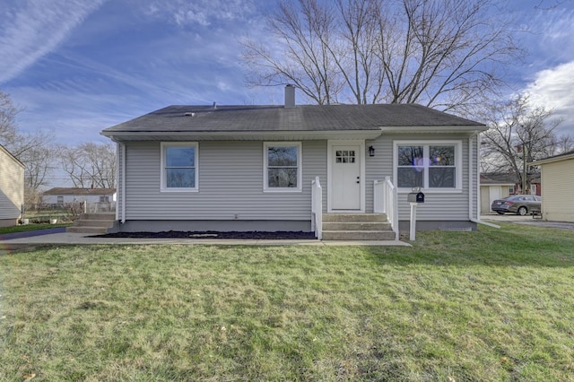 view of front facade with a front lawn