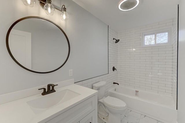 full bathroom with tiled shower / bath combo, toilet, and vanity