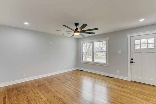 entryway featuring ceiling fan and light hardwood / wood-style flooring