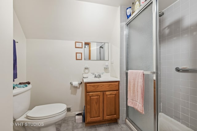 bathroom with tile patterned flooring, vanity, toilet, and a shower with shower door