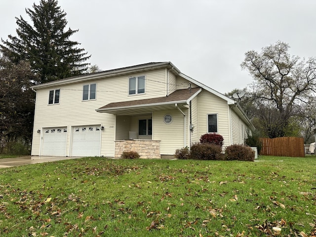 front facade with a front lawn and a garage