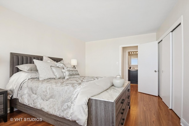 bedroom featuring a closet and wood finished floors