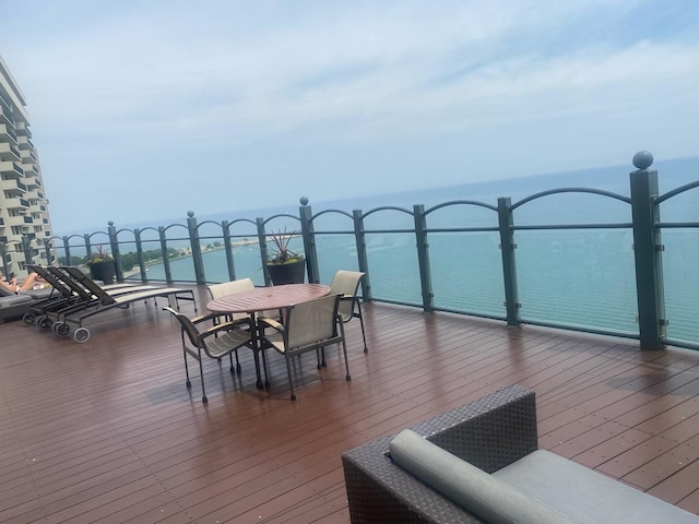 deck featuring a water view