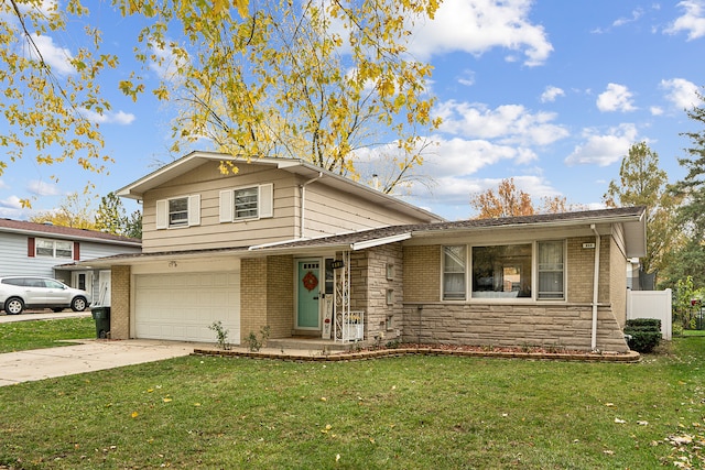 view of front of property with a garage and a front lawn