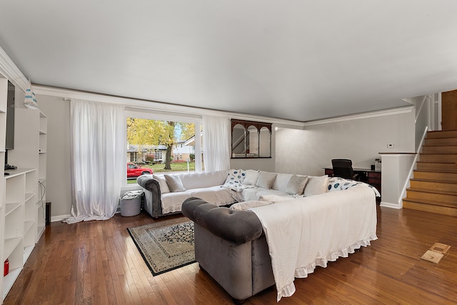 bedroom featuring crown molding and dark wood-type flooring