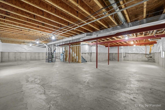 basement featuring heating unit