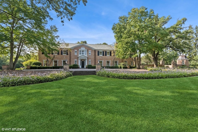 view of front of house with a front yard