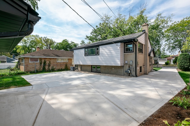 view of property exterior with cooling unit