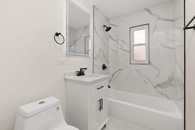 full bathroom with vanity, tiled shower / bath combo, and toilet