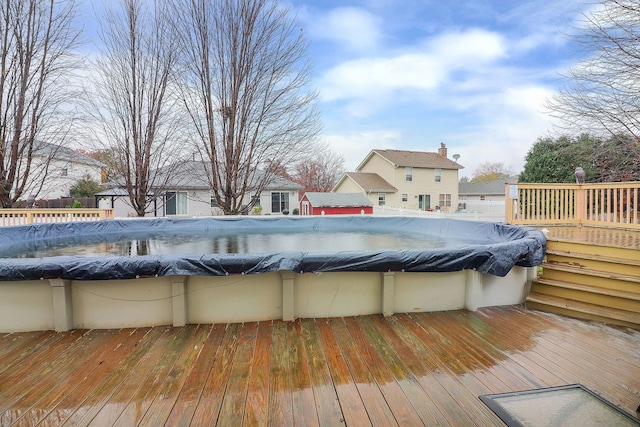 view of pool featuring a wooden deck