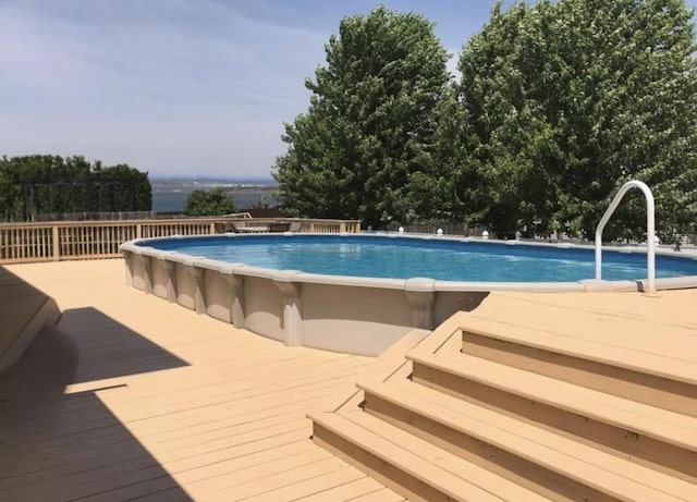 view of pool featuring a deck