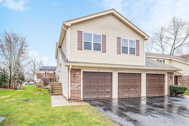 view of home's exterior featuring a garage, a yard, and a deck