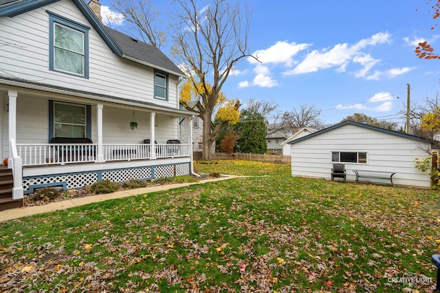 view of yard featuring covered porch