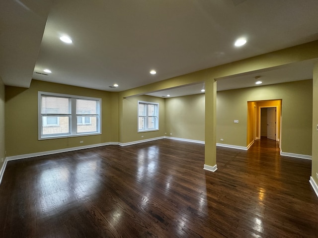 interior space with dark hardwood / wood-style flooring