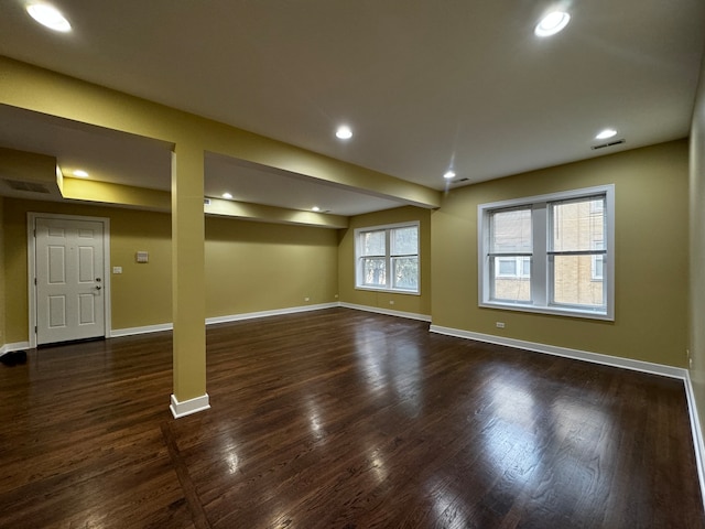 basement featuring dark wood-type flooring