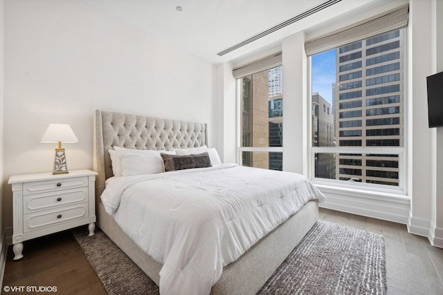 bedroom featuring dark hardwood / wood-style floors