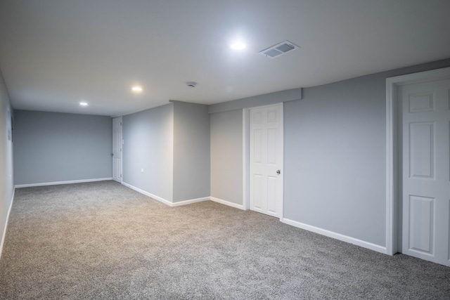 basement featuring carpet flooring