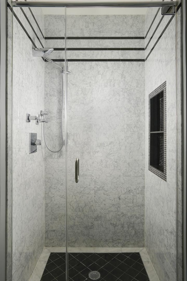 full bathroom with a stall shower