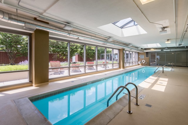 pool featuring a skylight