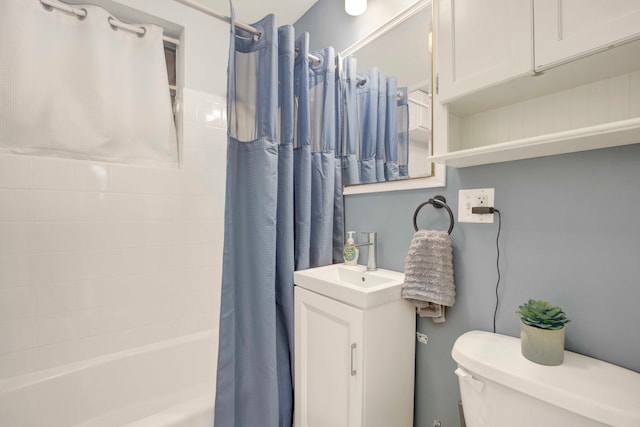 full bathroom featuring vanity, toilet, and shower / bath combo with shower curtain