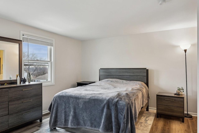 bedroom featuring dark hardwood / wood-style floors