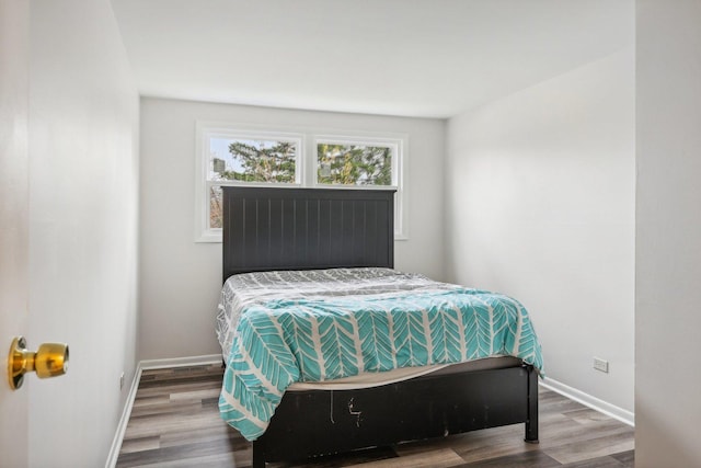 bedroom featuring hardwood / wood-style floors