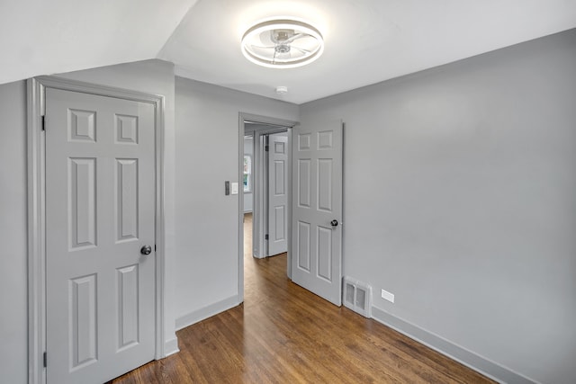 unfurnished bedroom featuring wood-type flooring