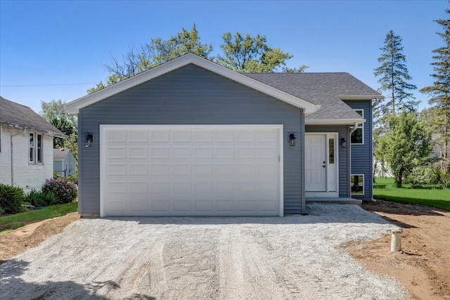 single story home with a garage