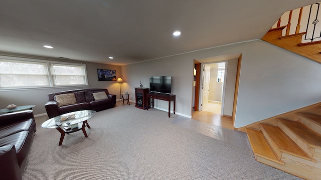 living room featuring light carpet